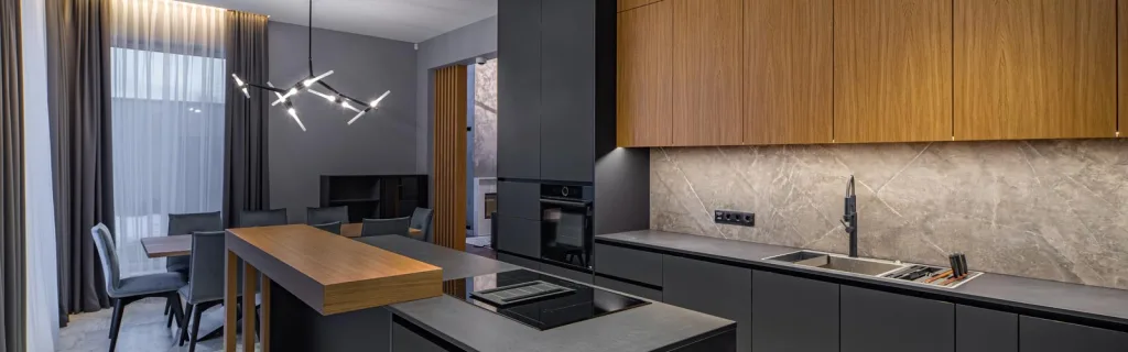 Modern gray adn wood kitchen with island and dinning area